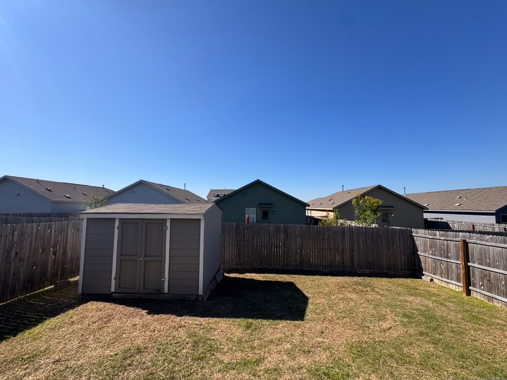 Backyard with storage shed